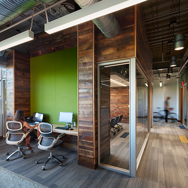 Office area with wooden paneled walls
